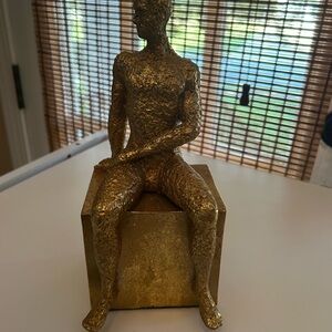 Golden Textured Sitting Figure Sculpture very lightweight